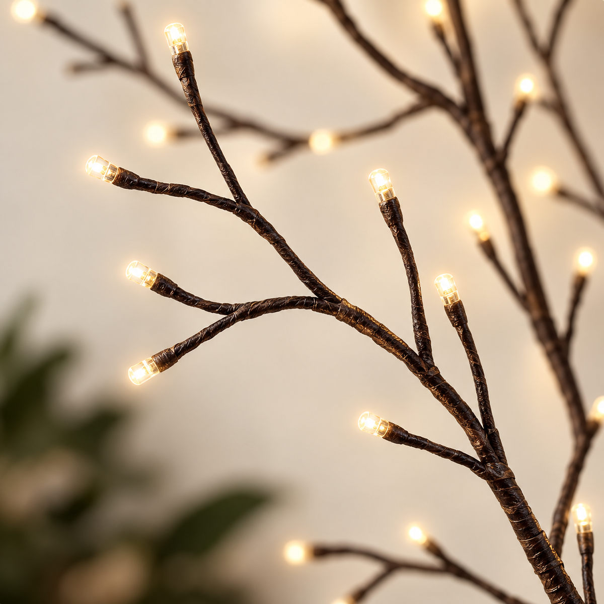 Close-up of the warm LED lights on a WillowGleam branch